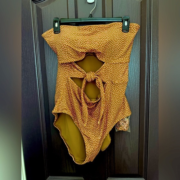 aerie Other - Aerie NWT one piece swimsuit taupe and orange print with tie cutout front